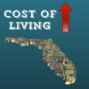 An illustration of the sate of Florida full of dollar bills, underneath the words cost of living, with a red arrow pointing up.